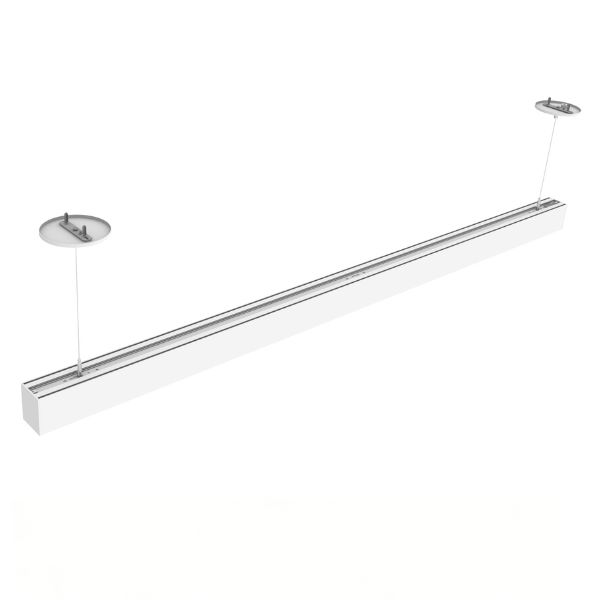 A spacious retail showroom with 30ft high ceilings featuring suspended 72-inch linear light segments arranged in geometric patterns, delivering high-lumen output and superior glare reduction.